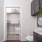 walk-in closet with shelving in bathroom