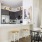 c-shaped kitchen adjacent to dining area